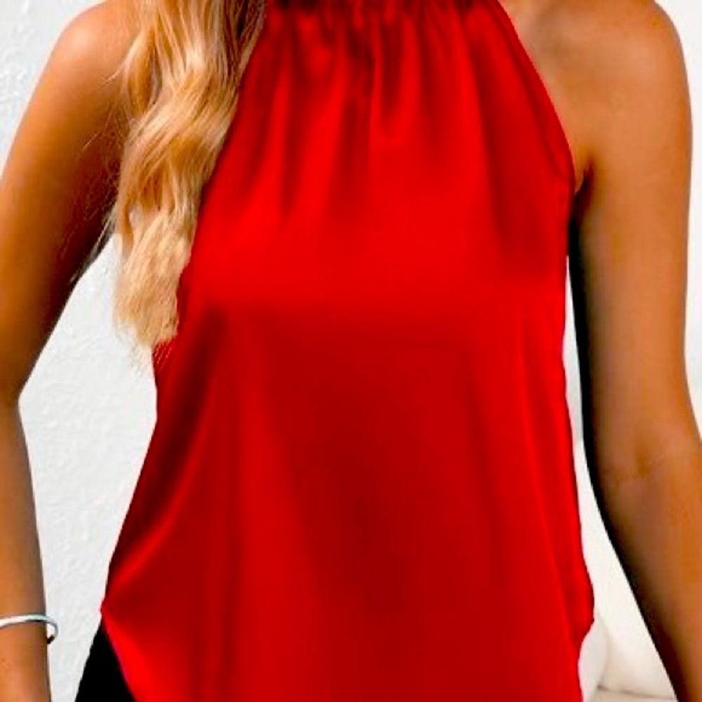 This is a red beautiful tank top new without tags never been worn